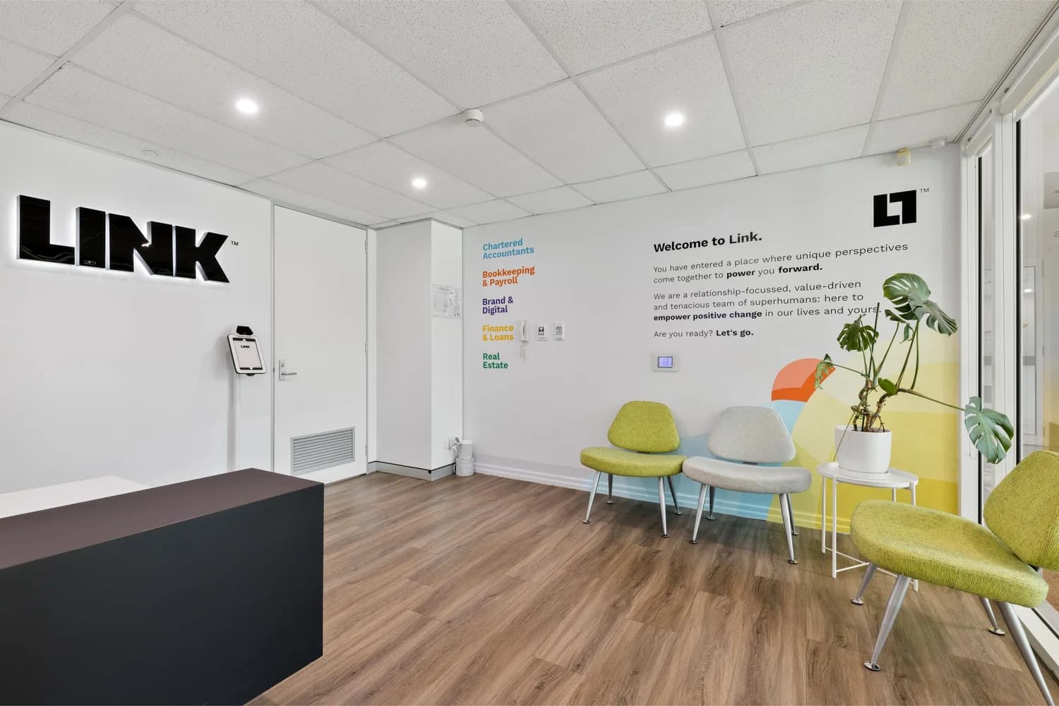 Reception lounge and welcome area at LINK Coworking